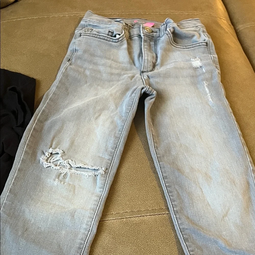 Black Graphic Tee and Light Grey Distressed Jeans